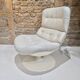 Fauteuil pivotant en cuir patiné gris