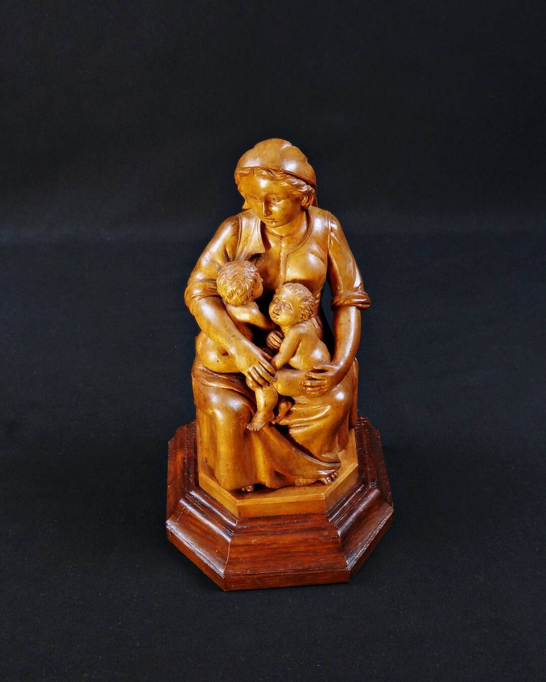 Virgin breastfeeding the Child Jesus and Saint John religious sculpture wood