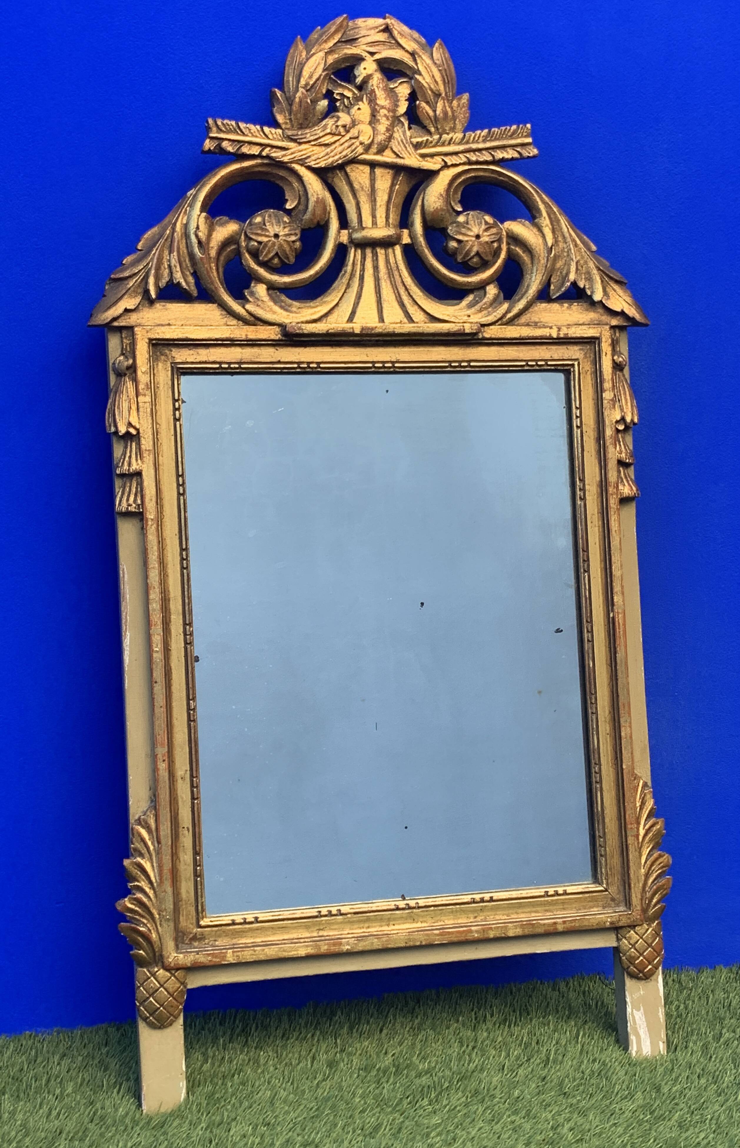 Antique mirror with gilded wood pediment, Louis XVI style
