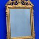 Antique mirror with gilded wood pediment, Louis XVI style
