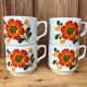 Lot of 4 mug old vintage orange flower decoration stackable. Unstoppable state