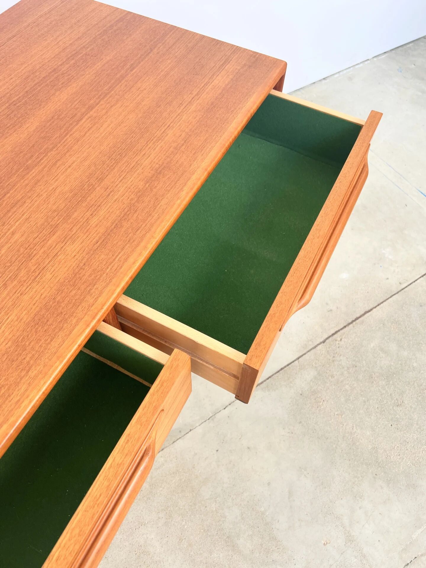 Lowboard teak 4 drawers — Mid-century lines, tapered legs, 1960s