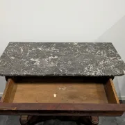 Console restored in flamed mahogany, Sainte-Anne marble, claw feet.