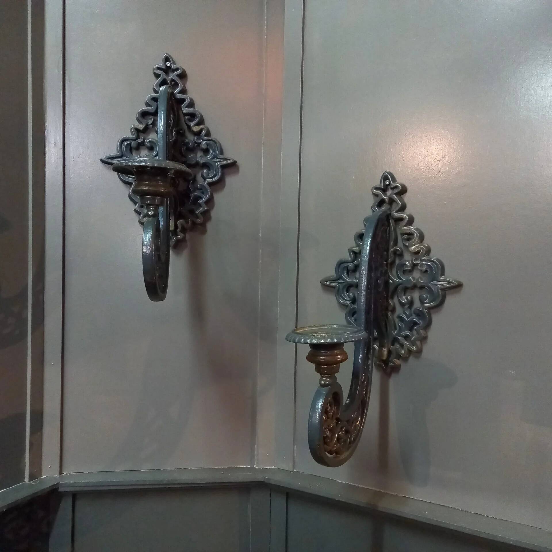 Set of antique neo-Gothic cast iron wall sconces
