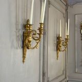 Pair of Louis XVI style wall sconces in gilded bronze, circa 1880.