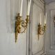 Pair of Louis XVI style wall sconces in gilded bronze, circa 1880.