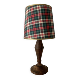 Turned wooden lamp, tartan lampshade.