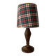Turned wooden lamp, tartan lampshade.