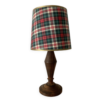 Turned wooden lamp, tartan lampshade.