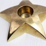 Star-shaped brass candle holder