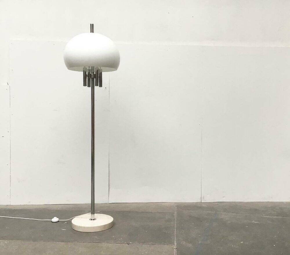 Italian space-style floor lamp from the 1960s with a stone base.