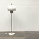 Italian space-style floor lamp from the 1960s with a stone base.