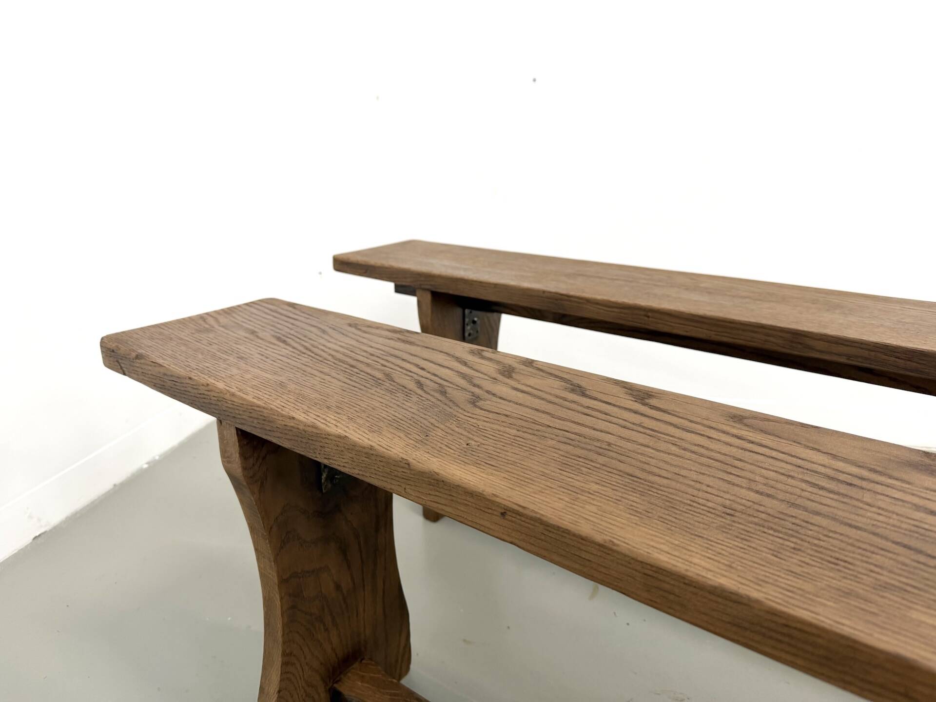 Pair of solid oak benches, winged legs, France, 1970s