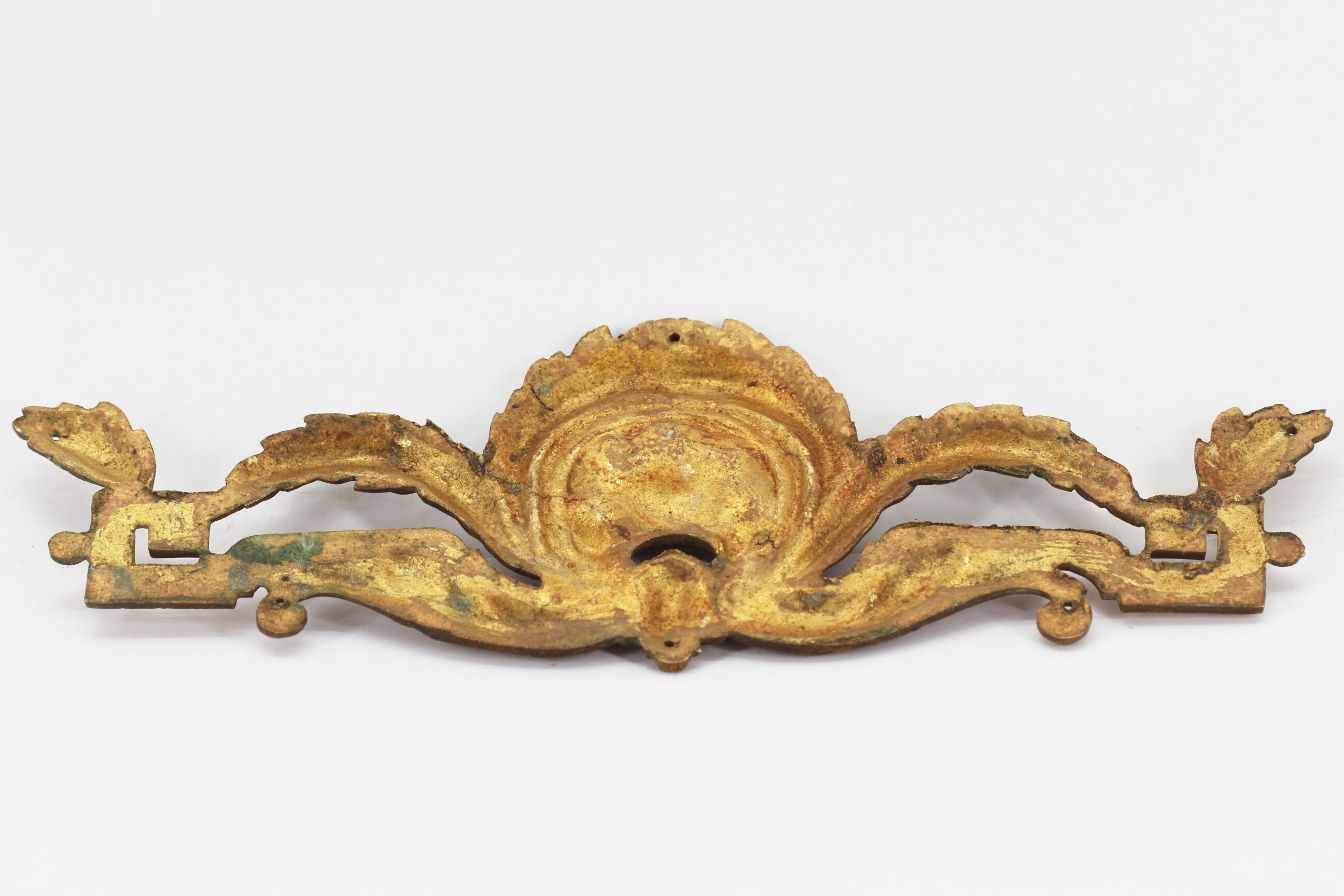 Old brass pediment