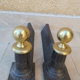 Pair of cast iron and bronze chenets