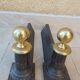 Pair of cast iron and bronze chenets