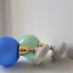 Duo of porcelain and opaline wall lamps