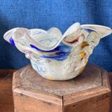 Multi-layer glass ashtray with metallic oxide inclusions.