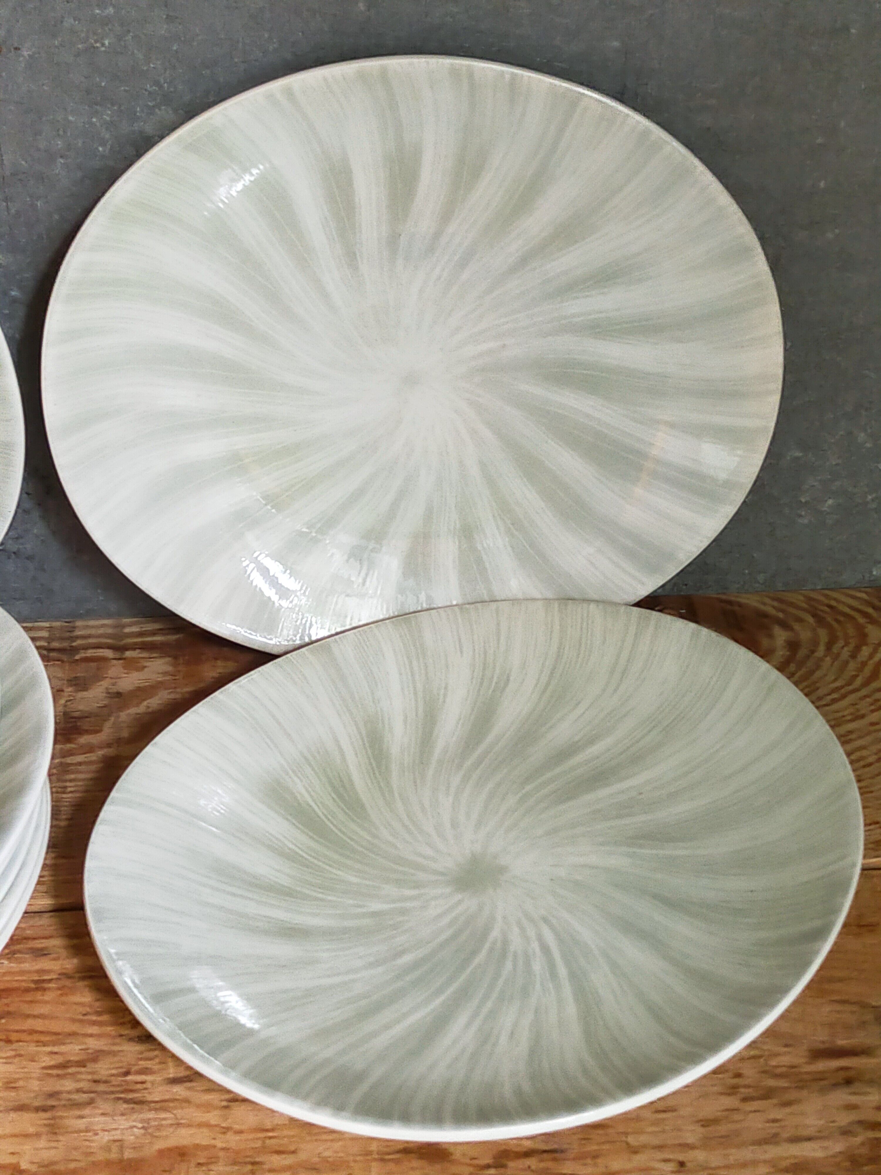 Nine earthenware plates from Salins-les-Bains vintage