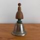 Vintage metal bell and wooden handle