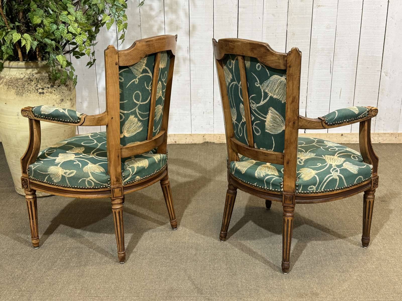 Pair of Louis XVI style armchairs in beech from the 19th century.