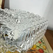 Old small square wall light ceiling fixture with transparent vintage glass.