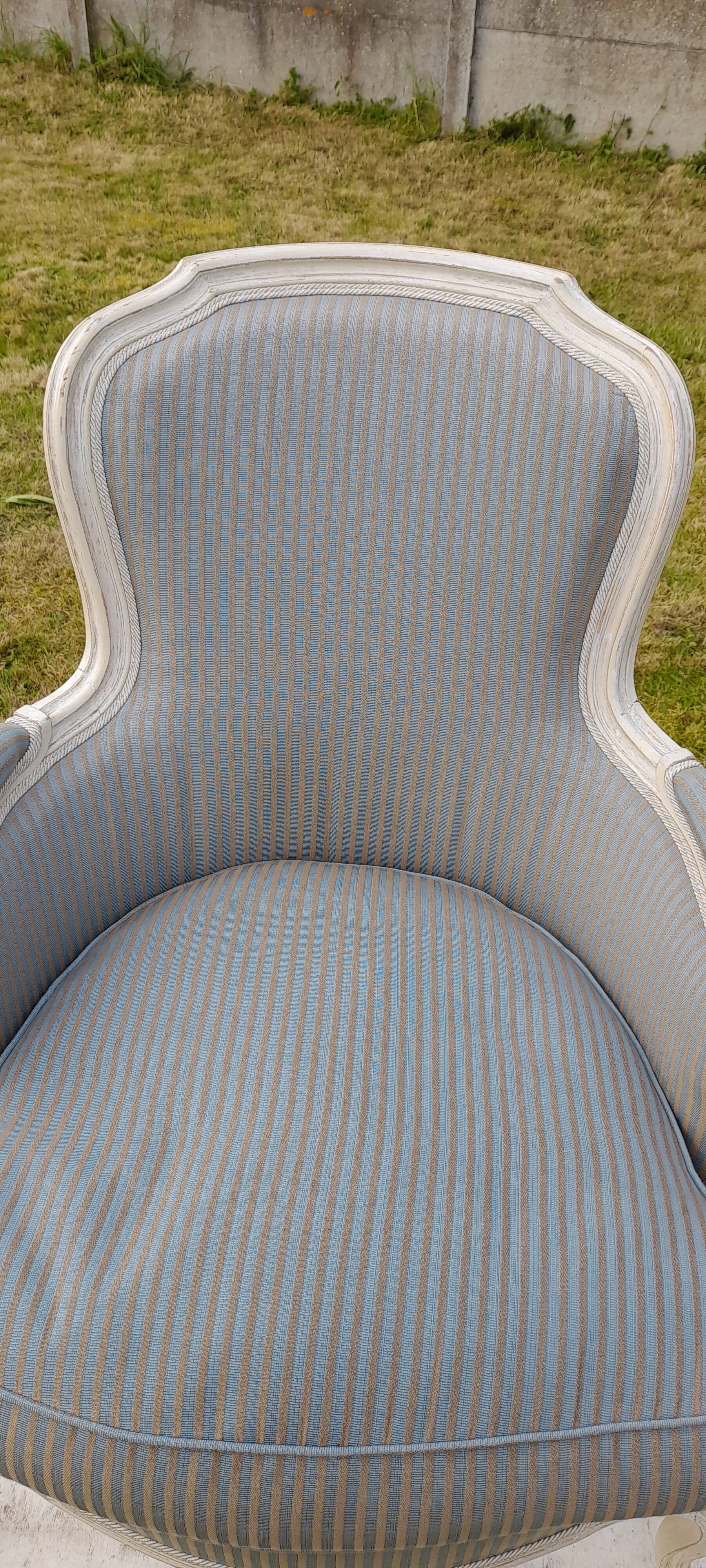 Bergère armchair with blue striped seat and back