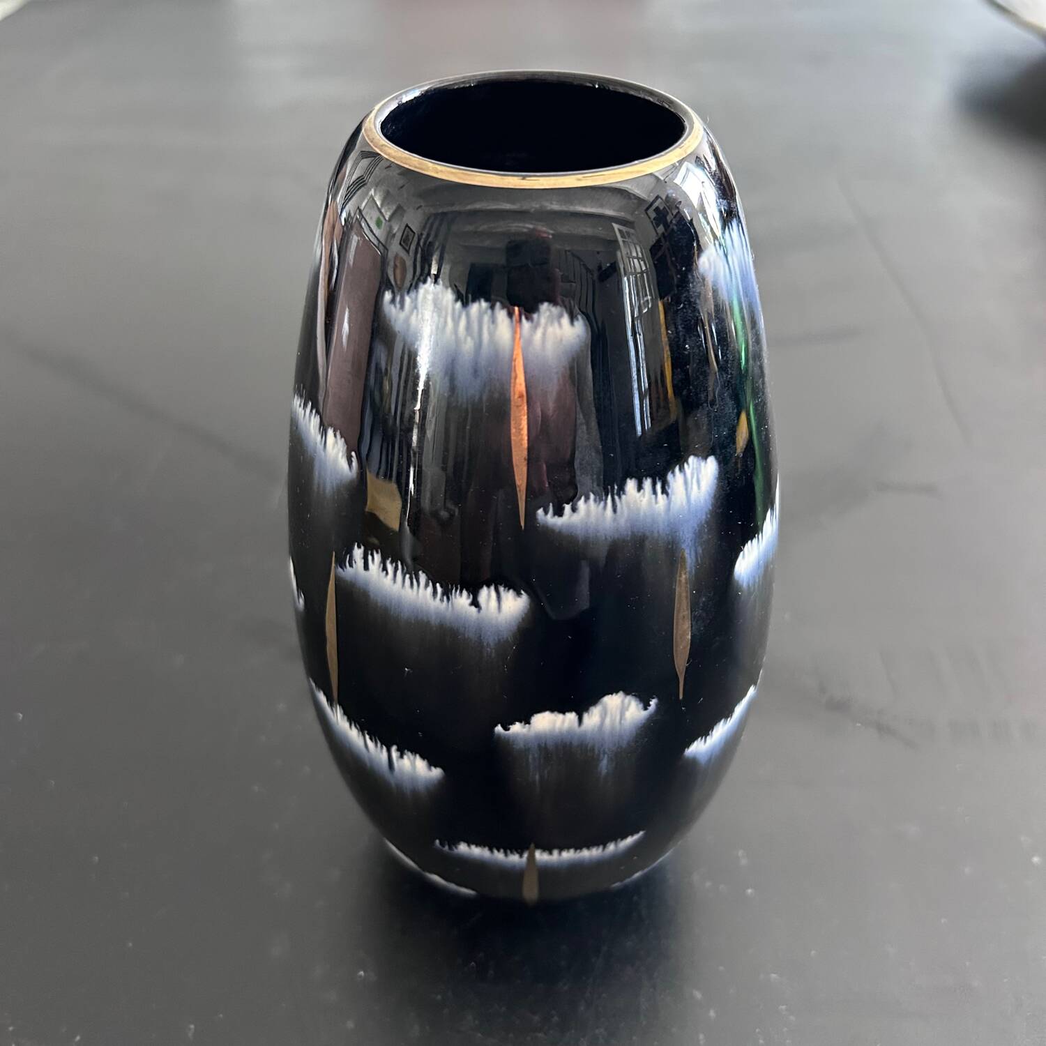 Black, white and gold art deco vase
