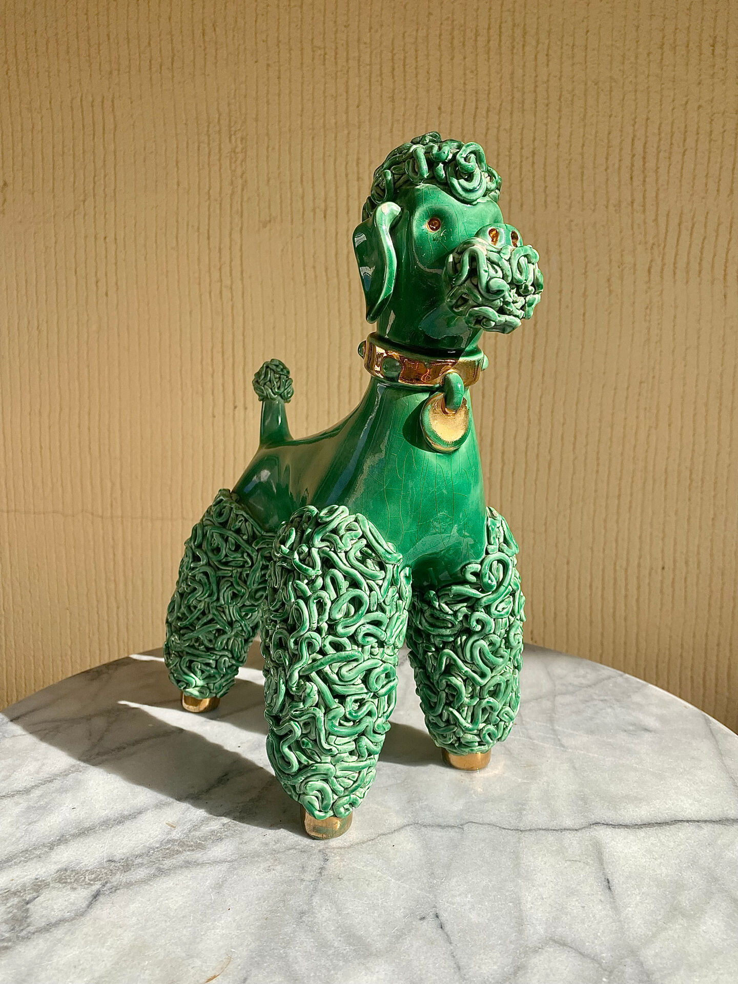 Large green glazed ceramic spaghetti poodle from the 60s.