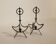 Pair of modernist wrought iron fire dogs