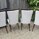 Set of 4 Vintage Mid-Century Modern Chairs with tapered metal legs.