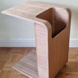 Boone coffee table in curved wood produced by Habitat, design