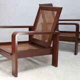 Pair of large armchairs. Wood and cane. Circa 1960