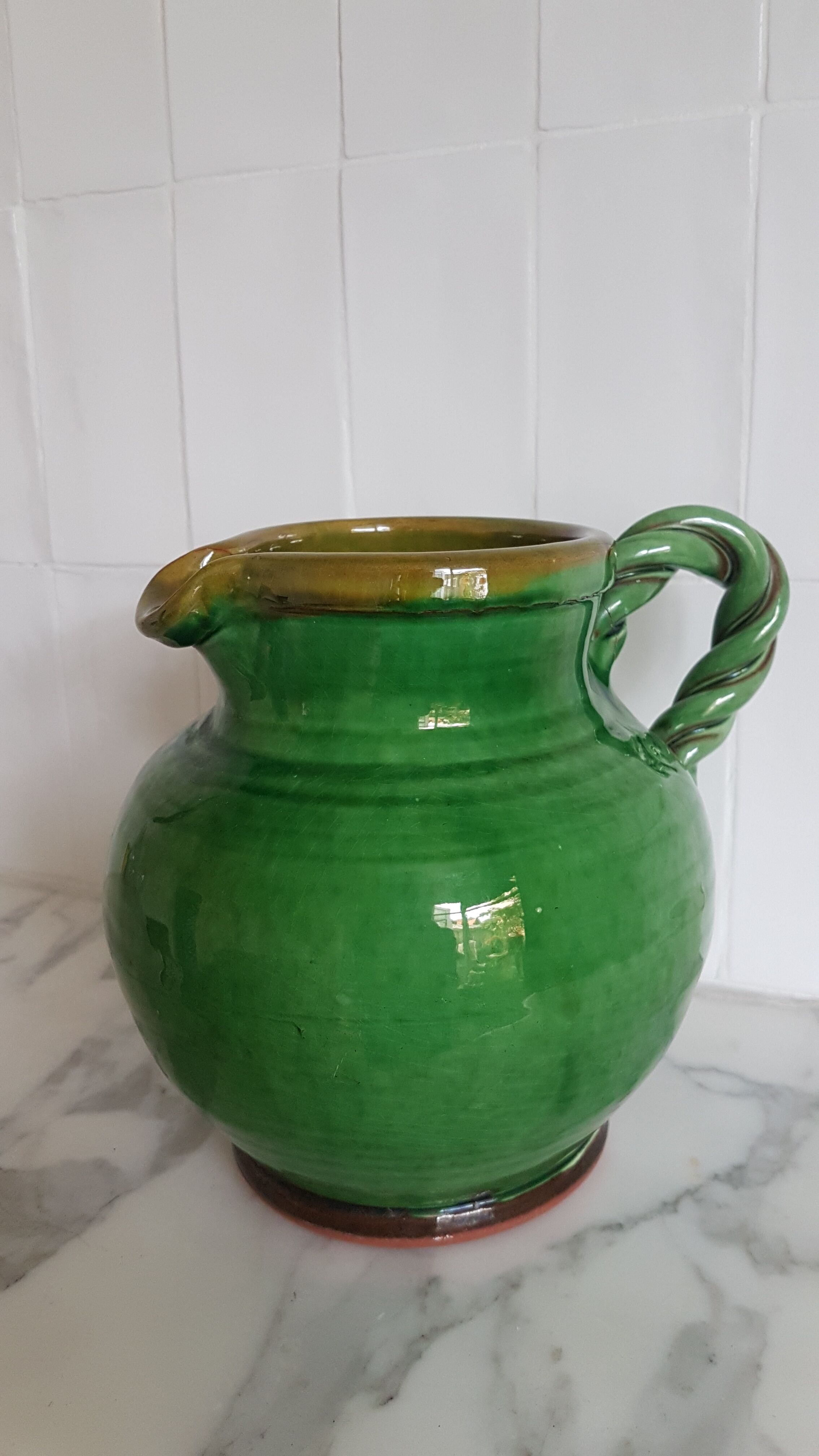 Green ceramic jug
