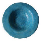 Empty turquoise raku pocket