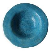 Empty turquoise raku pocket