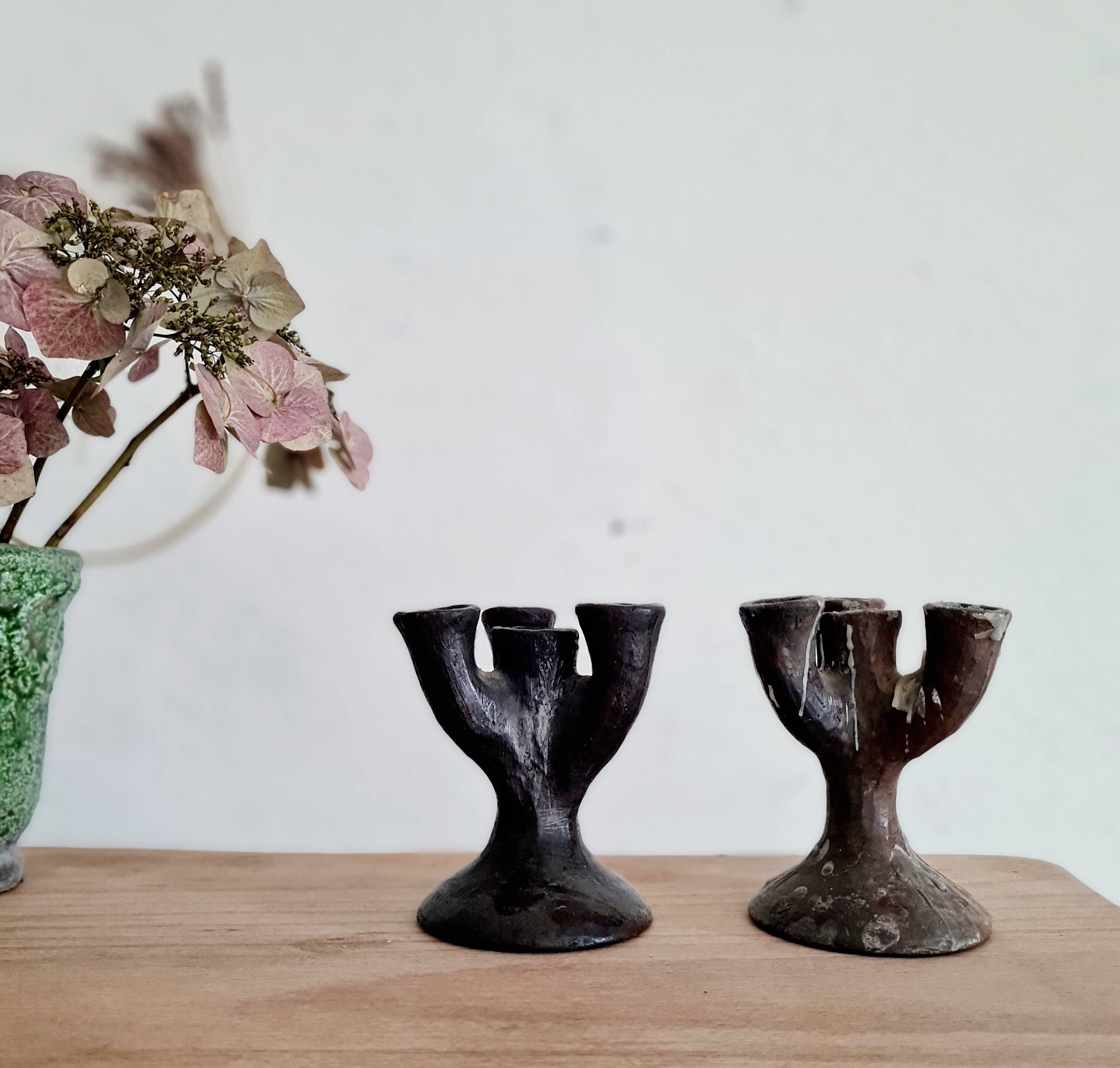 Antique terracotta candlesticks