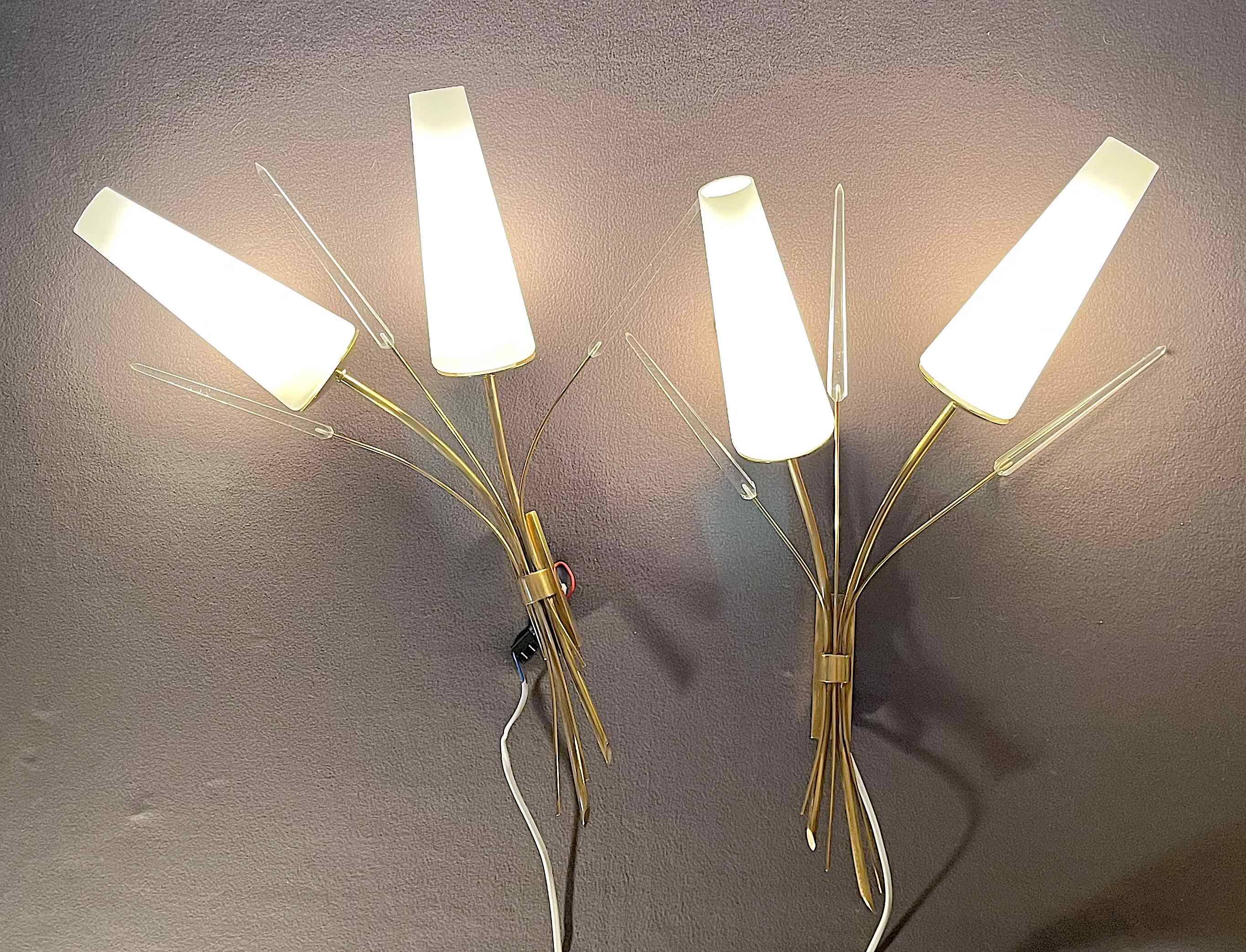 Pair of mid-century modern opaline brass wall lights, Maison Lunel, France, 1950