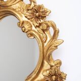 Baroque mirror in golden resin