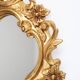 Miroir baroque en résine dorée