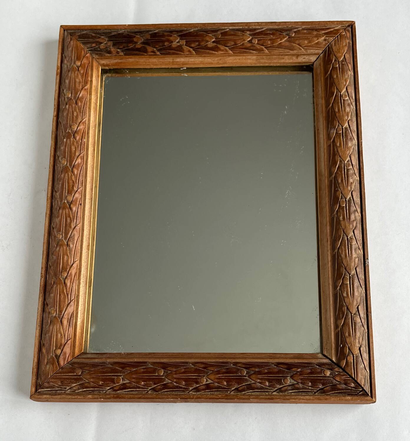 Antique carved wooden mirror