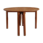 Extendable round table in solid beech, 1980s.