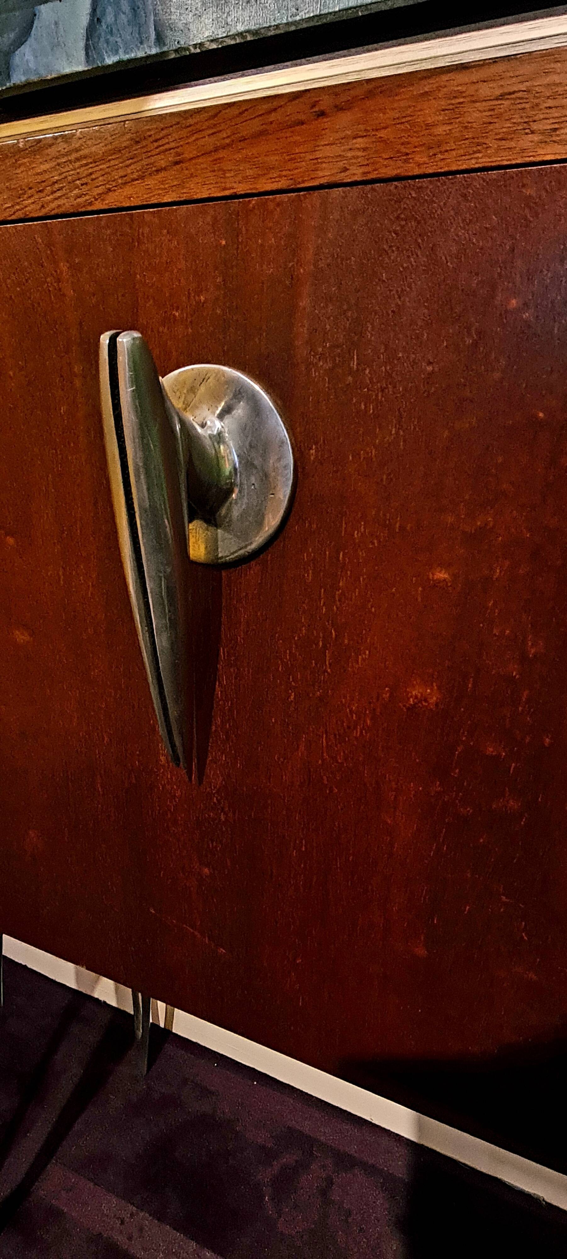 Sideboard from studio wunderkammer in rosewood and cast aluminum