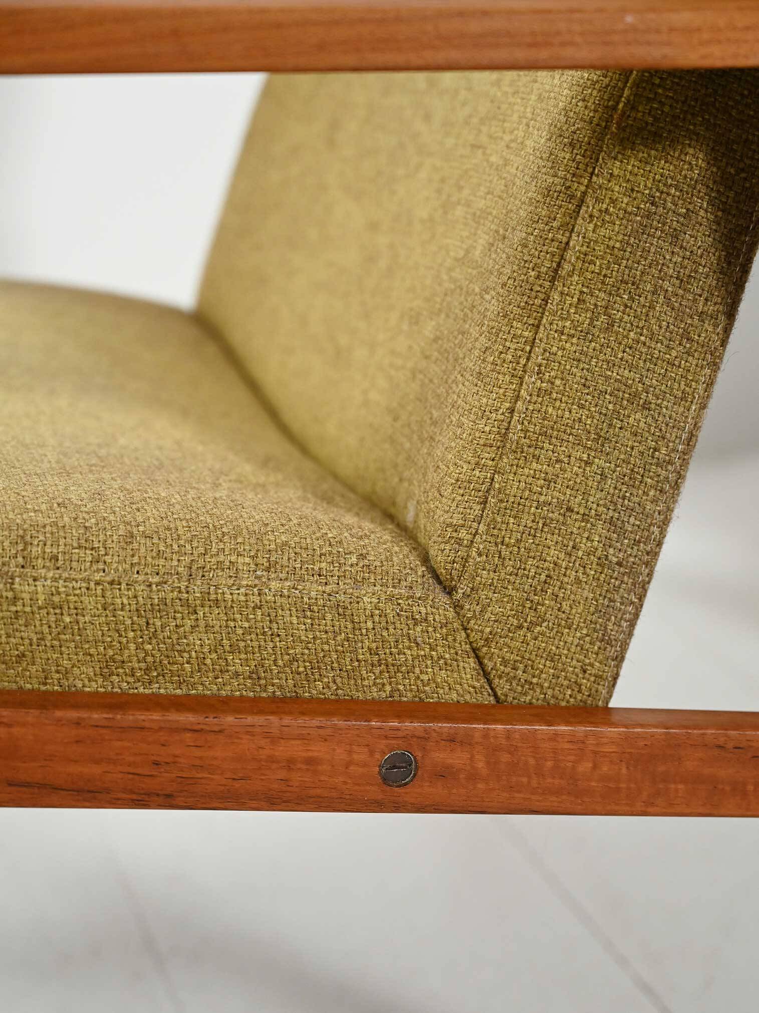 Pair of Danish teak armchairs with green upholstery