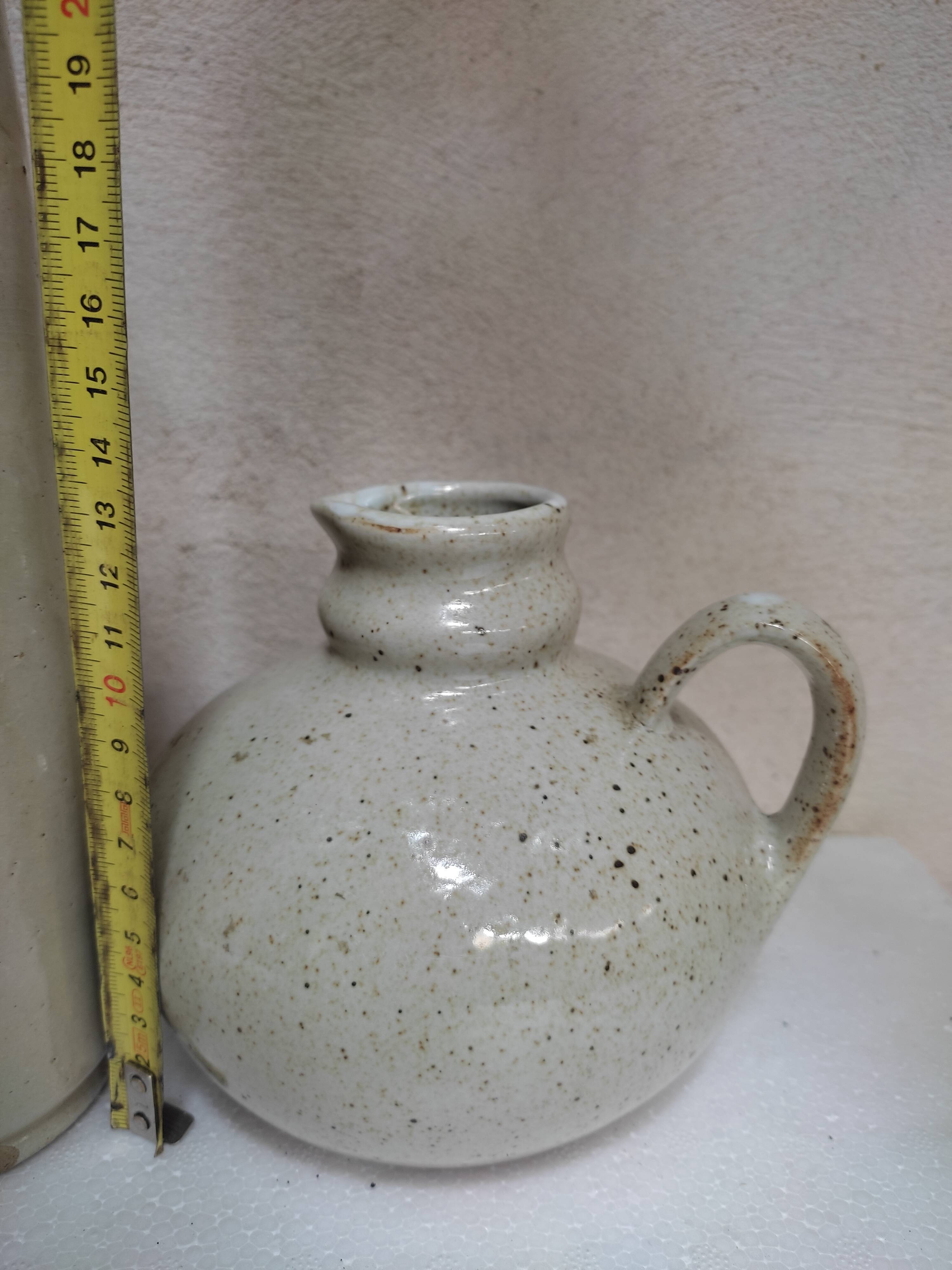 Set of sandstone bottles and pitchers