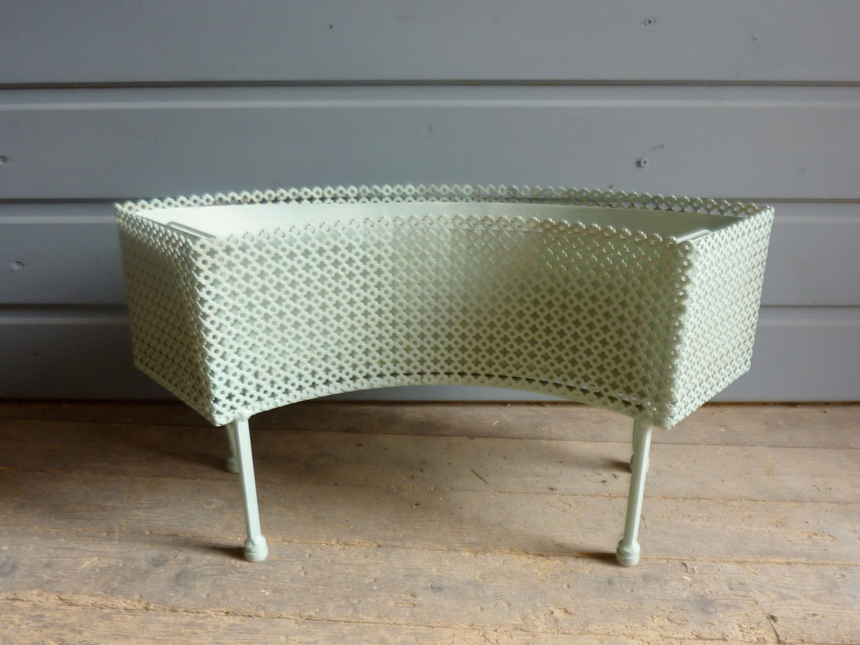 Perforated metal planter from the 1950s