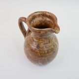 Brown speckled stoneware pitcher in very good condition