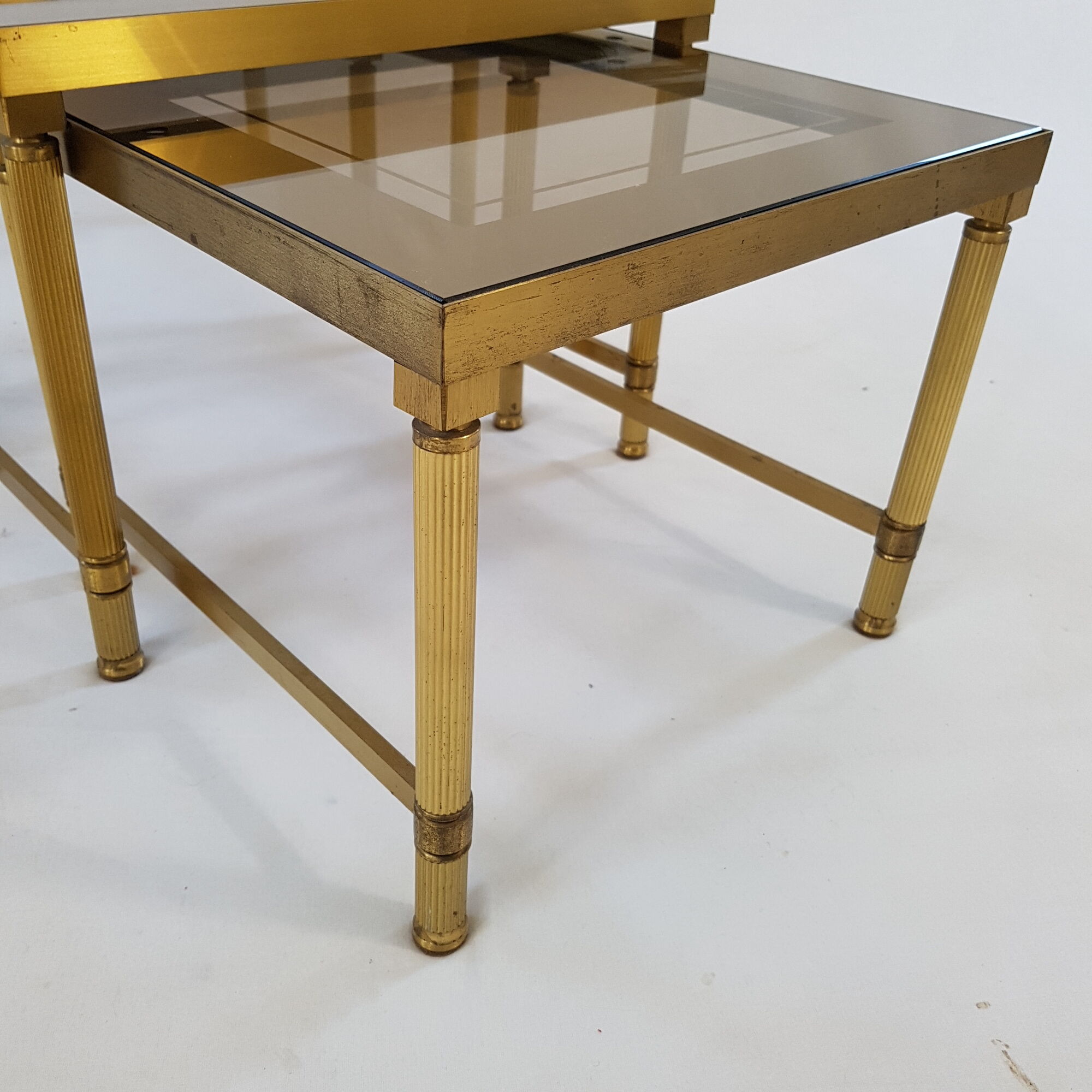 Brass pull-out tables