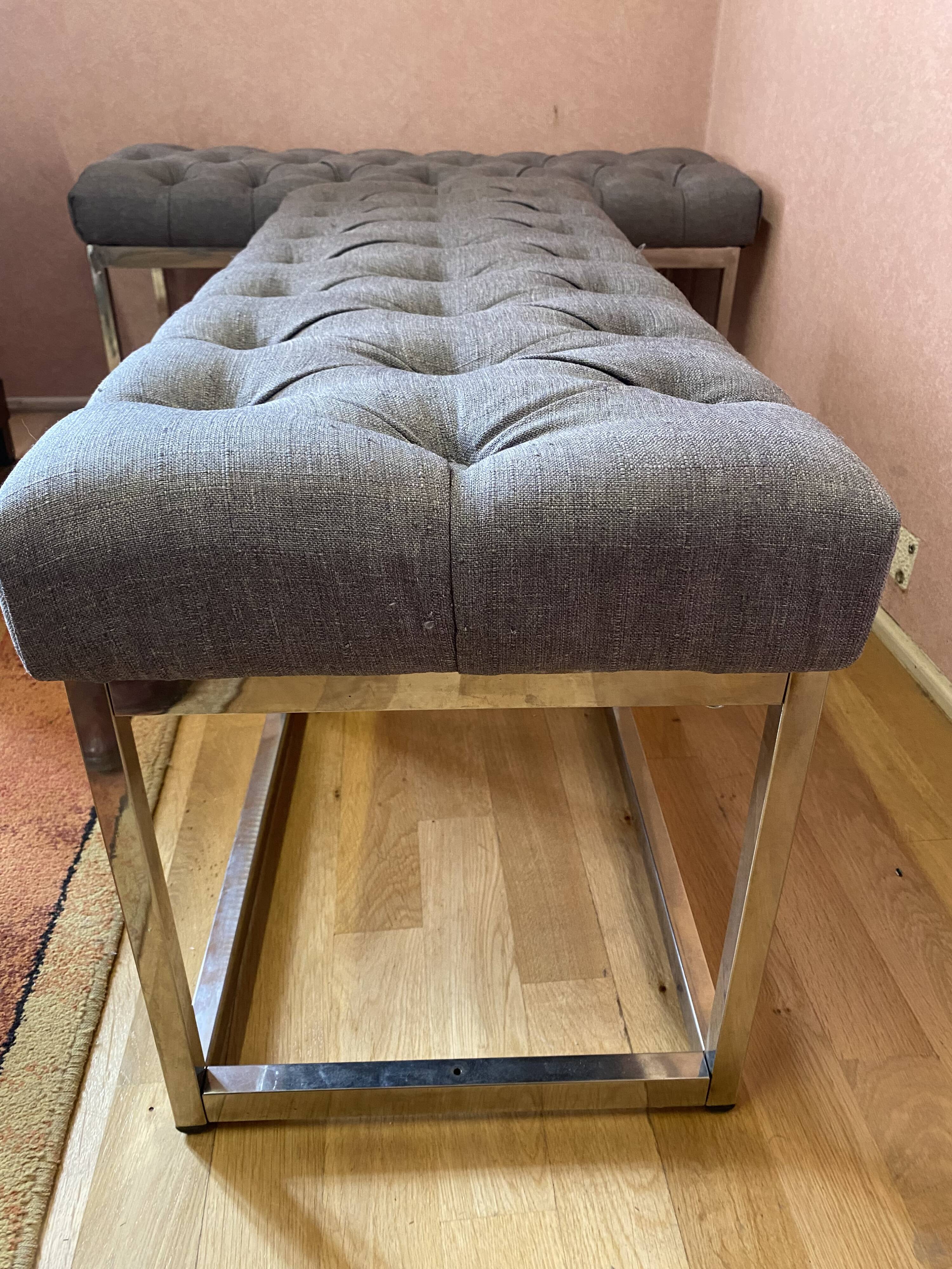 Pair of benches in chrome metal and padded gray fabric