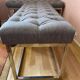 Paire de banquettes en métal chromé et tissu gris capitonné